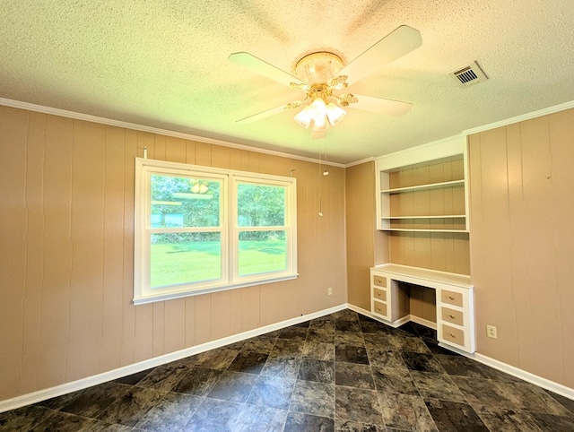 602 Cobb Rd, Dothan, AL 36301 - unfurnished office with wood walls, a textured ceiling, a ceiling fan, and ornamental molding