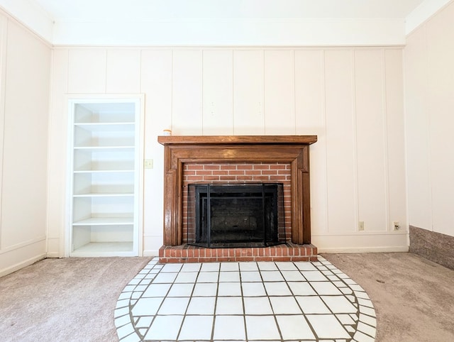 602 Cobb Rd, Dothan, AL 36301 - detailed view of carpet floors, built in shelves, a fireplace, and a decorative wall
