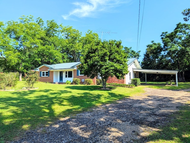 602 Cobb Rd, Dothan, AL 36301 - view of front of house with driveway, a front yard, and an attached carport
