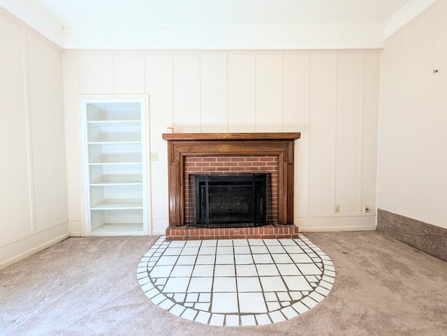602 Cobb Rd, Dothan, AL 36301 - detailed view of a decorative wall, carpet floors, and a brick fireplace