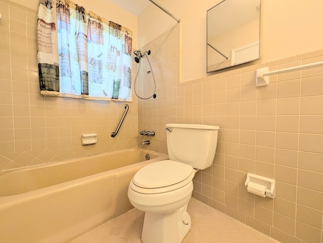 602 Cobb Rd, Dothan, AL 36301 - bathroom with tile walls, shower / washtub combination, and tile patterned flooring