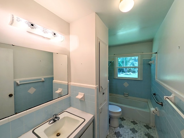 602 Cobb Rd, Dothan, AL 36301 - bathroom with tile walls, shower / tub combination, vanity, wainscoting, and tile patterned flooring