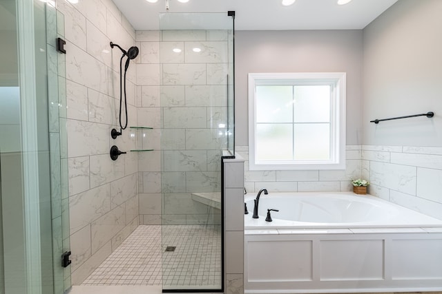 bathroom with independent shower and bath