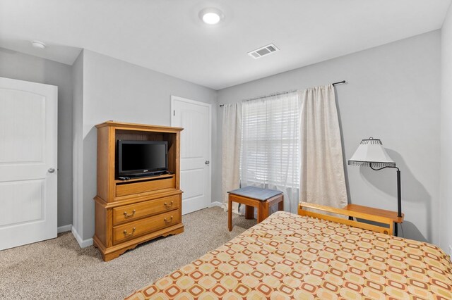 bedroom featuring carpet flooring