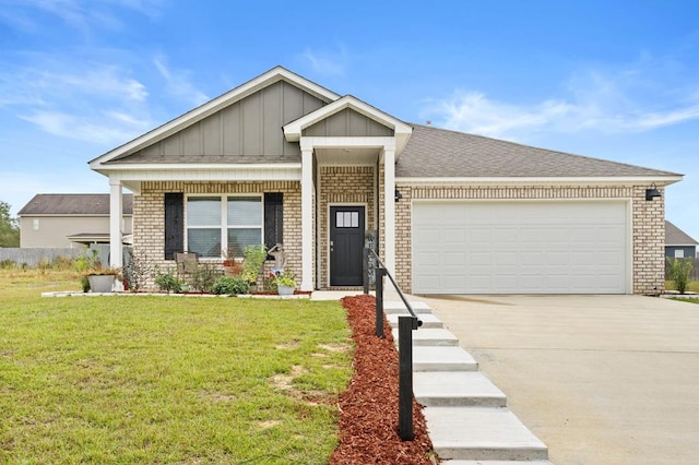 craftsman house featuring a garage and a front yard