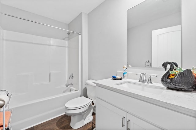 full bathroom featuring vanity, toilet, shower / bathing tub combination, and hardwood / wood-style flooring