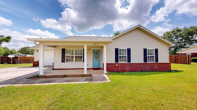 284 Alec Cir, Ozark, AL 36360 - view of front facade featuring an attached garage, concrete driveway, brick siding, and covered porch