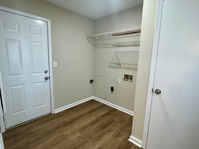 laundry area featuring hookup for an electric dryer, dark hardwood / wood-style floors, and washer hookup