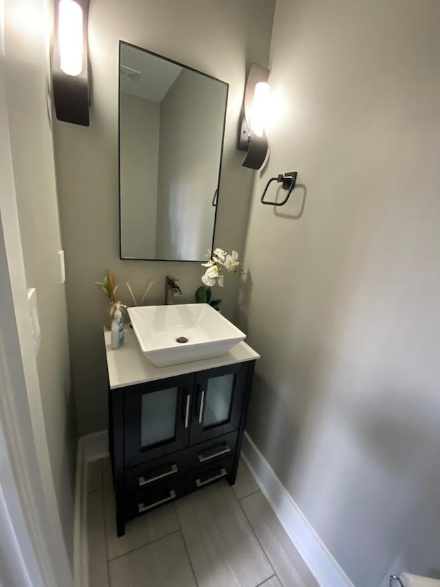 bathroom with vanity and tile patterned floors