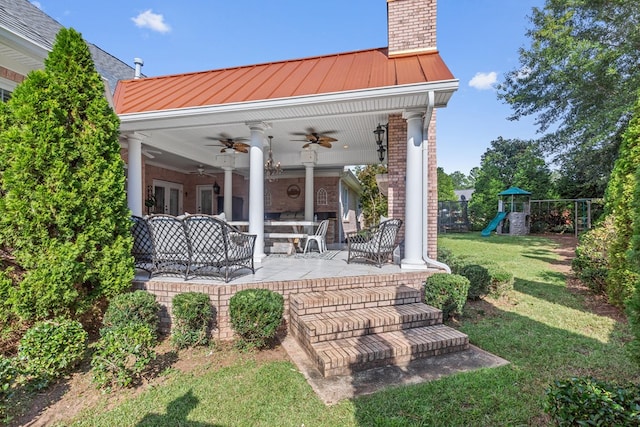 view of patio with fence, a playground, ceiling fan, and an outdoor living space