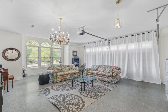 living area with speckled floor, baseboards, and visible vents
