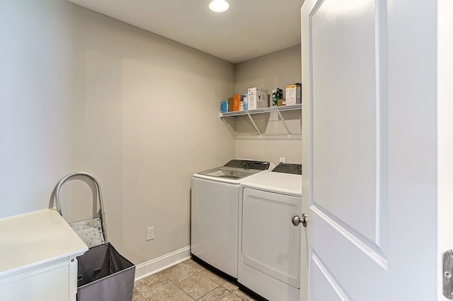 120 Puent Dr, Dothan, AL 36301 - laundry area with washer and dryer, baseboards, recessed lighting, and light stone finish floors