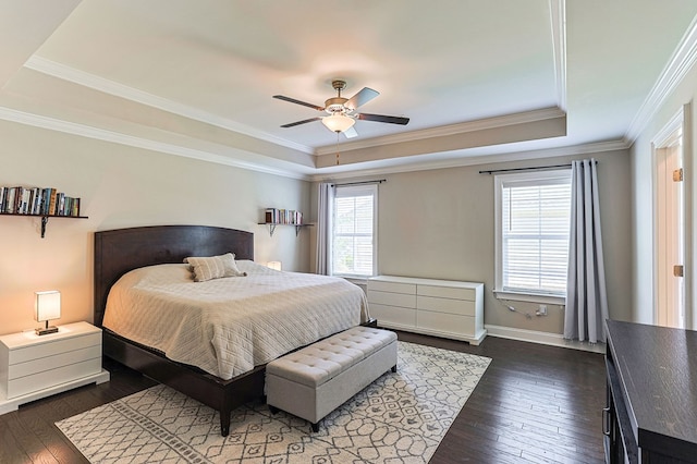120 Puent Dr, Dothan, AL 36301 - bedroom featuring a raised ceiling, dark wood-type flooring, ornamental molding, baseboards, and ceiling fan