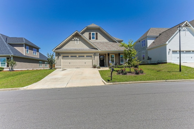 120 Puent Dr, Dothan, AL 36301 - view of front of home featuring a front yard, concrete driveway, and an attached garage