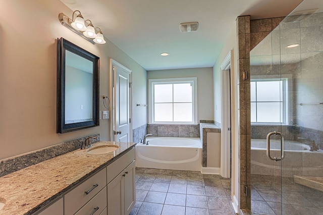 120 Puent Dr, Dothan, AL 36301 - full bathroom with healthy amount of natural light, a garden tub, vanity, and a shower stall
