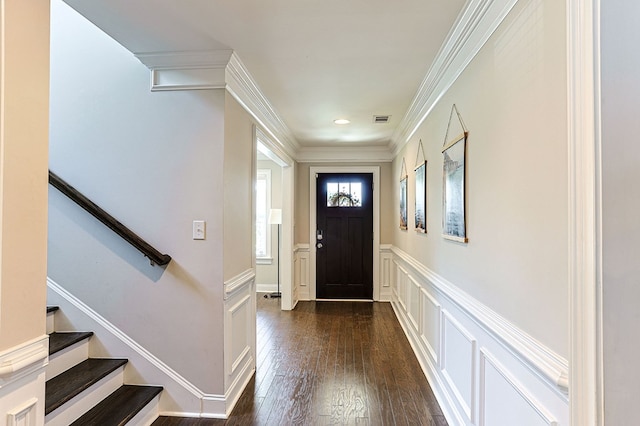 120 Puent Dr, Dothan, AL 36301 - entrance foyer with a decorative wall, a wainscoted wall, dark wood-type flooring, stairway, and ornamental molding