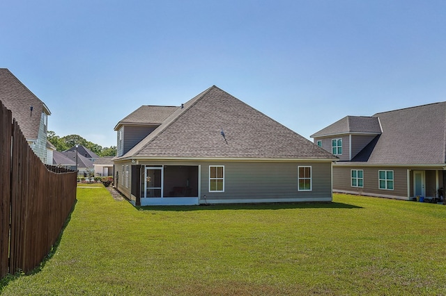 120 Puent Dr, Dothan, AL 36301 - rear view of house with a sunroom and roof with shingles