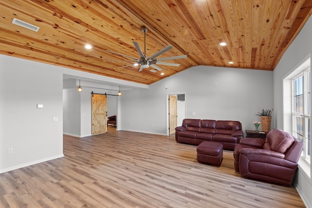 living room featuring wooden ceiling, vaulted ceiling, light wood-type flooring, ceiling fan, and a barn door