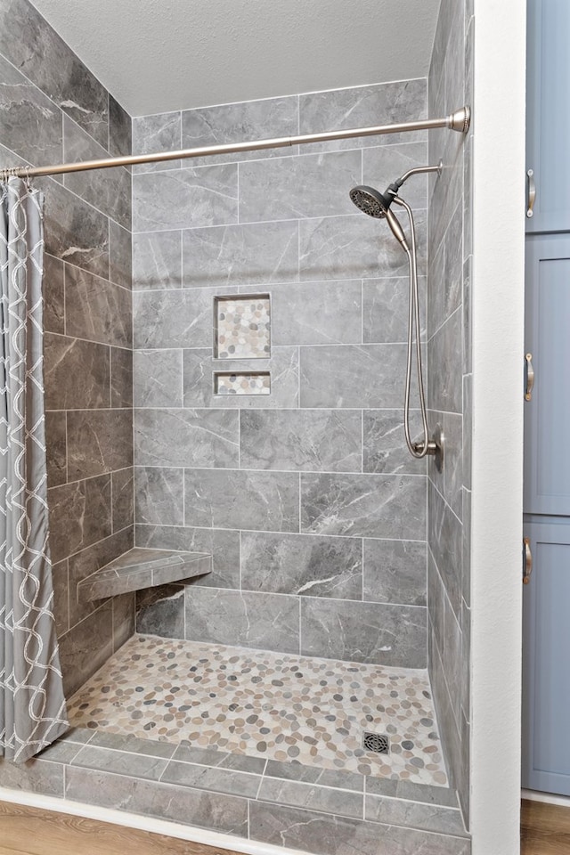 bathroom featuring walk in shower