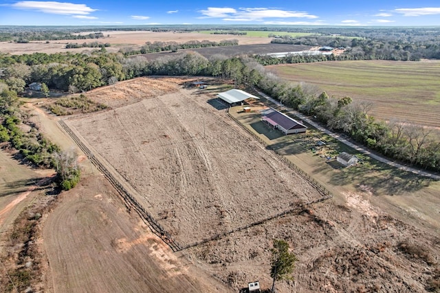 birds eye view of property featuring a rural view