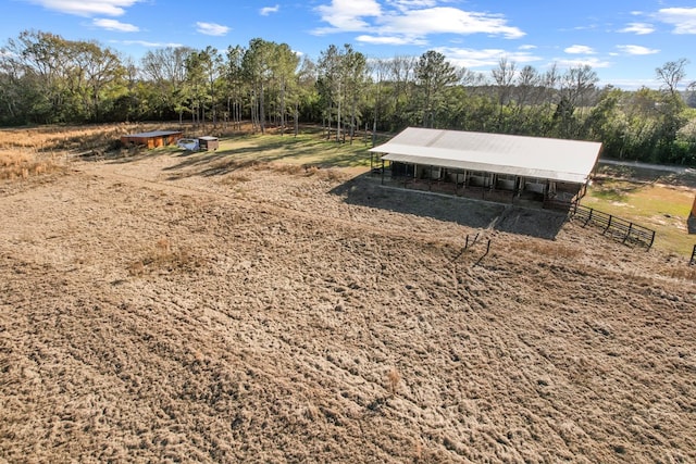 exterior space with an outbuilding and a rural view