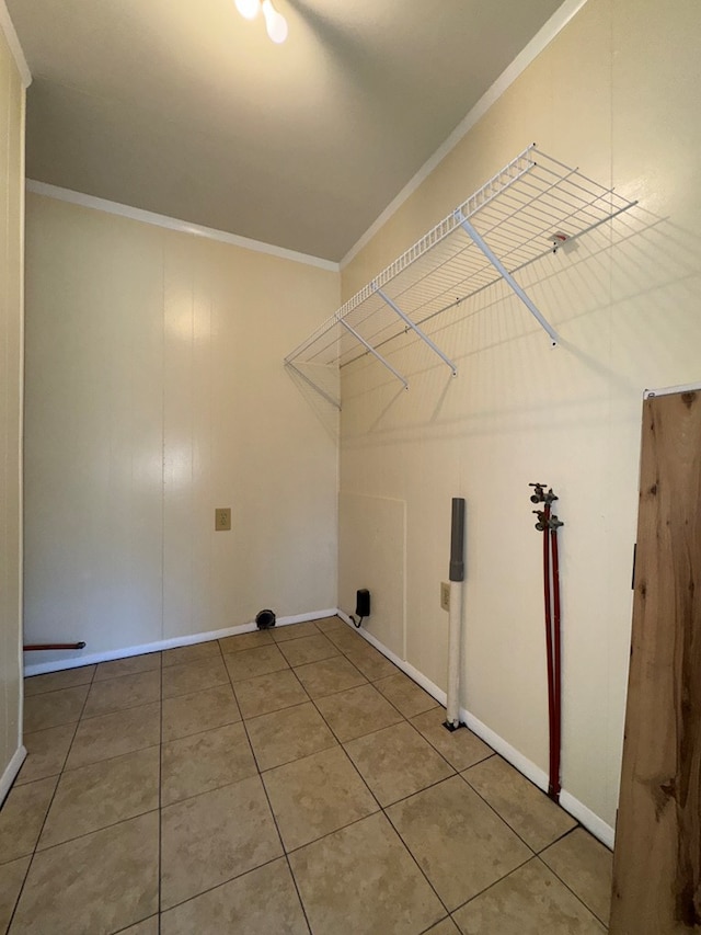 629 Coe Dairy Rd, Dothan, AL 36301 - laundry area featuring crown molding, baseboards, and tile patterned flooring