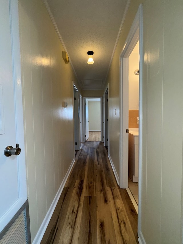 629 Coe Dairy Rd, Dothan, AL 36301 - hall with wood finished floors, crown molding, and a textured ceiling