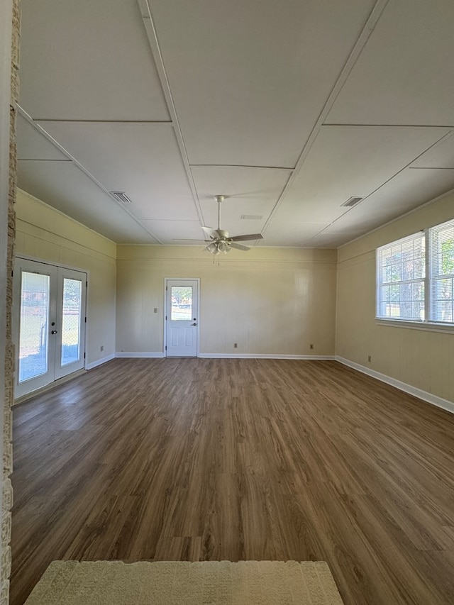 629 Coe Dairy Rd, Dothan, AL 36301 - empty room with wood finished floors, french doors, a ceiling fan, and baseboards