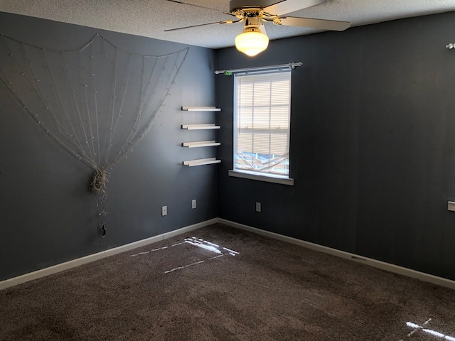 unfurnished room featuring ceiling fan, a textured ceiling, baseboards, and carpet flooring