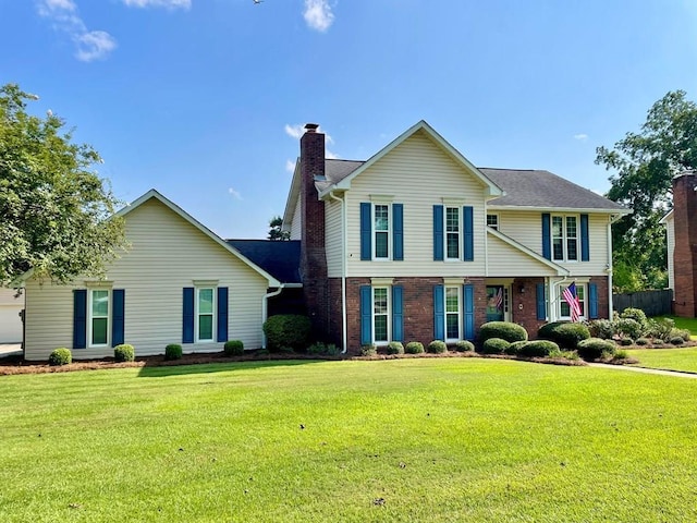 view of front of property featuring a front yard