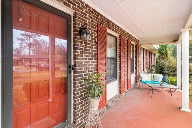 doorway to property featuring a porch