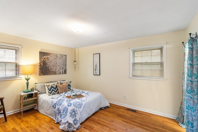 bedroom featuring light wood-type flooring