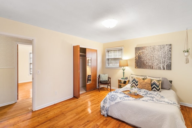 bedroom with light wood-type flooring