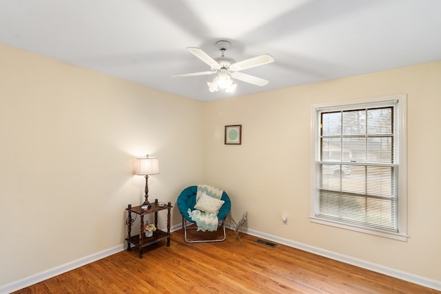 unfurnished room with ceiling fan and light hardwood / wood-style floors