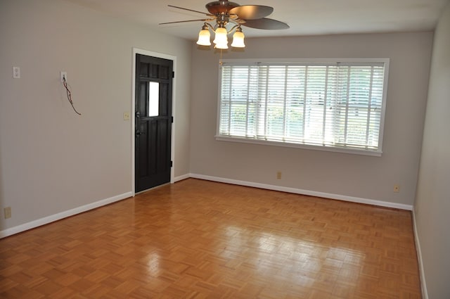 entryway featuring ceiling fan and light parquet floors