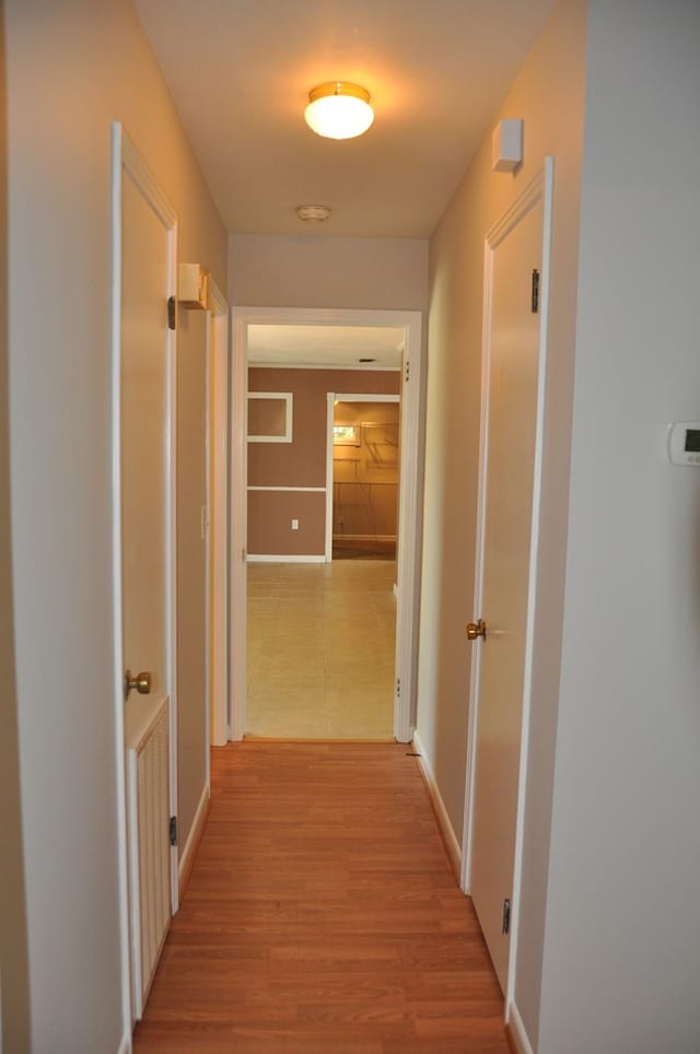 hall featuring light hardwood / wood-style flooring