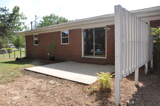 back of house featuring a patio