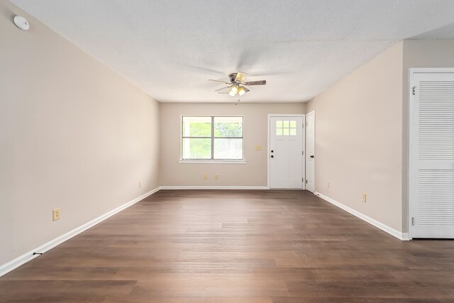 212 Johanna Dr, Ozark, AL 36360 - spare room with a ceiling fan, dark wood finished floors, and a smoke detector