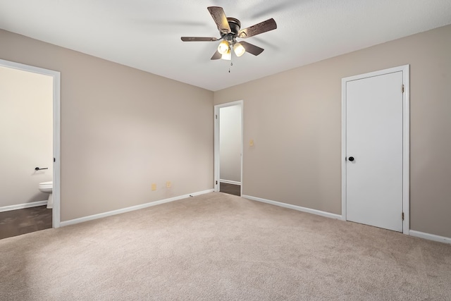 212 Johanna Dr, Ozark, AL 36360 - unfurnished bedroom featuring carpet, ensuite bathroom, and a ceiling fan