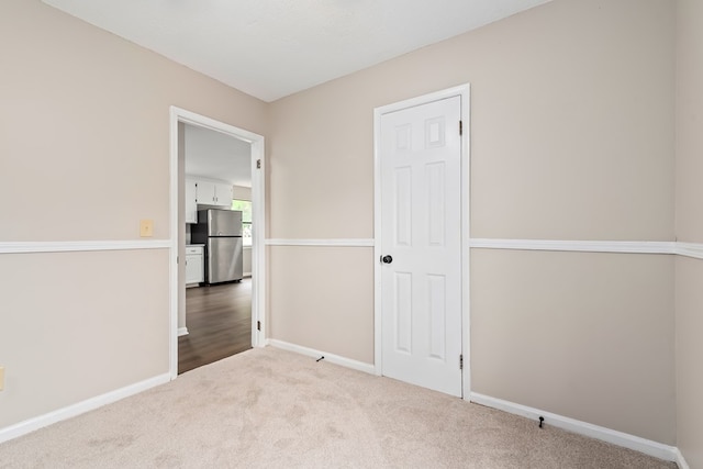 212 Johanna Dr, Ozark, AL 36360 - carpeted empty room with baseboards