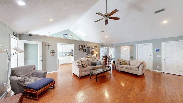 119 Willow Oaks Dr, Headland, AL 36345 - living room with ceiling fan, light wood-style flooring, baseboards, and visible vents
