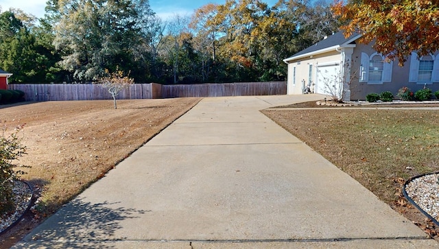 view of yard with a garage