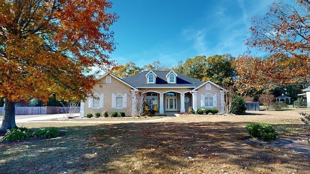 view of front of home with a front yard