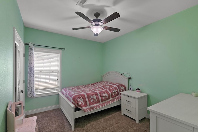 bedroom featuring baseboards, a ceiling fan, and carpet flooring