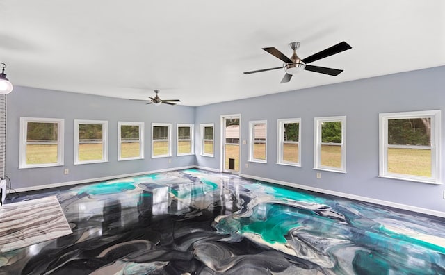 view of pool with ceiling fan