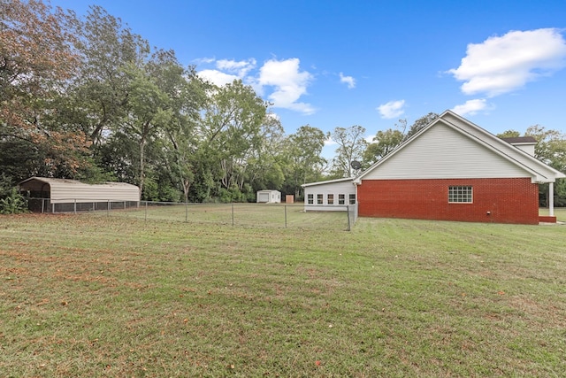 view of yard with a carport