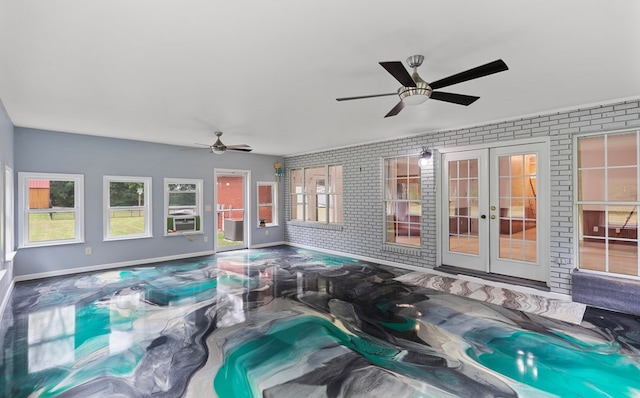 view of patio featuring ceiling fan and french doors