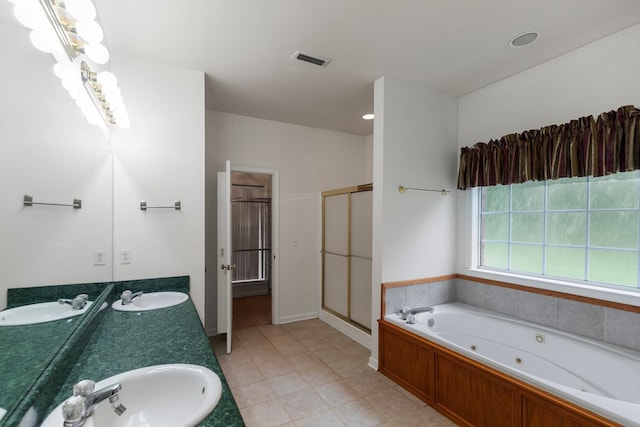 bathroom with vanity and plus walk in shower