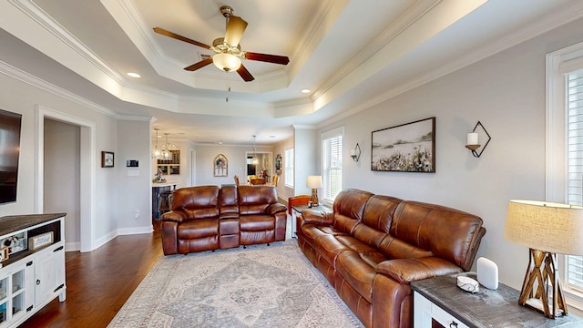160 Sandbed Rd, Newton, AL 36352 - living area with ceiling fan, a tray ceiling, dark wood-style floors, ornamental molding, and recessed lighting