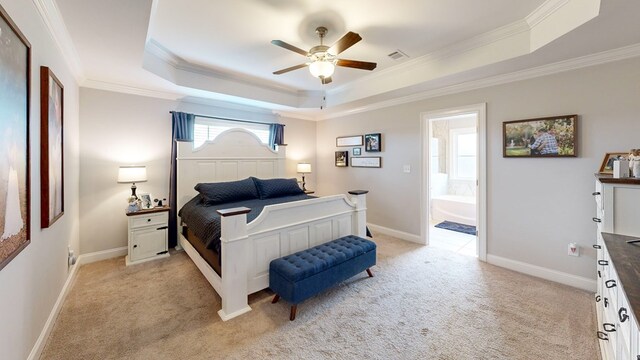 160 Sandbed Rd, Newton, AL 36352 - bedroom with a tray ceiling, crown molding, light colored carpet, ensuite bath, and a ceiling fan